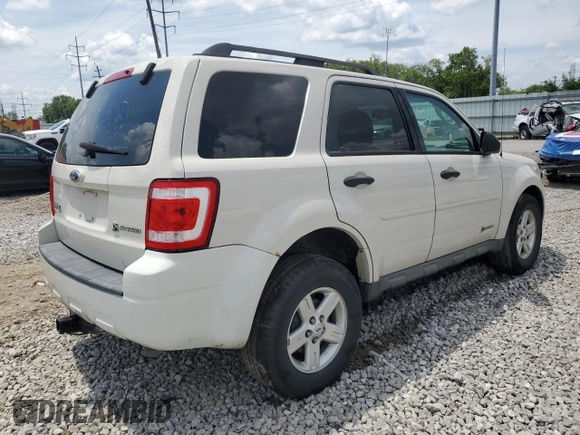 2009 Ford Escape Hybrid with VIN 1FMCU59309KC19243, listed as a Copart auction lot 61416915 with 74,732 mi miles and Salvage title. Bid and sale history available at DreamBid. Image 3.