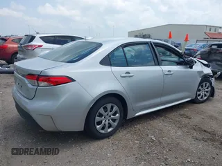 2023 Toyota Corolla LE with VIN 5YFB4MDE7PP015928, listed as a IAAI auction lot 42115319 with 60,434 mi miles. Bid and sale history available at carsss.com. Image 4.