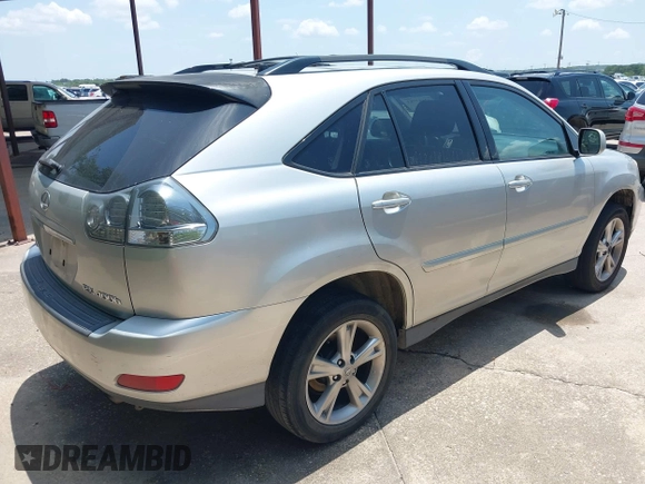 2006 Lexus RX 400h with VIN JTJGW31U362000391, listed as a IAAI auction lot 42687783 with 213,890 mi miles and . Bid and sale history available at DreamBid. Image 4.
