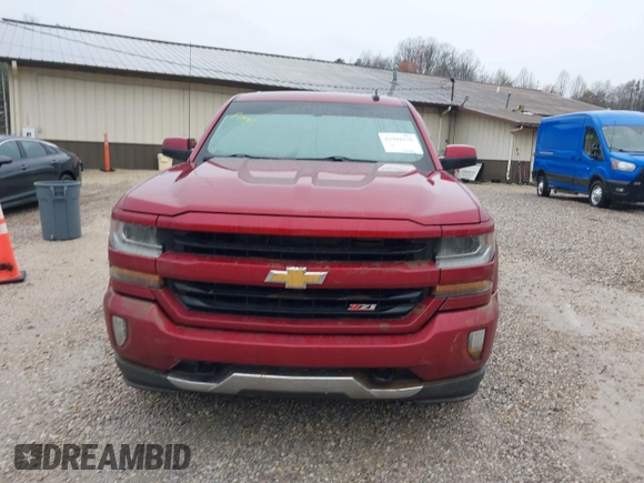 2018 Chevrolet Silverado 1500 LT with VIN 3GCUKREC2JG201754, listed as a IAAI auction lot 41944175 with 112,305 mi miles. Bid and sale history available at carsss.com. Image 13.