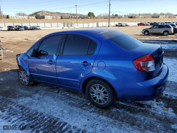 2013 Suzuki SX4 LE with VIN JS2YC5A38D6101442, listed as a Copart auction lot 42833395 with 154,379 mi miles and Salvage Title. Bid and sale history available at carsss.com. Image 2.