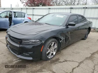 2015 Dodge Charger SXT with VIN 2C3CDXJG3FH919988, listed as a Copart auction lot 49340374 with 99,200 mi miles and Salvage title. Bid and sale history available at DreamBid. Image 1.