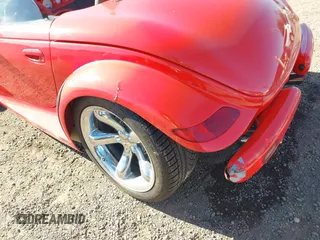 1999 Plymouth Prowler z VIN 1P3EW65G4XV503282, wystawiony jako IAAI lot #41282258 z przebiegiem 58 866 mil mil oraz . Historia ofert i sprzedaży dostępna na DreamBid. Obrazek 6.