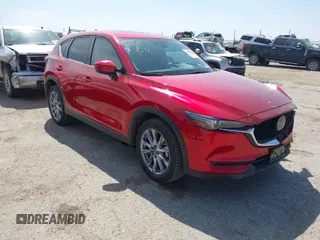 2020 Mazda CX-5 Grand Touring with VIN JM3KFBDMXL1747319, listed as a IAAI auction lot 41836570 with 36,991 mi miles. Bid and sale history available at carsss.com. Image 1.