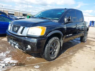 2013 Nissan Titan Pro-4X with VIN 1N6BA0EC4DN305032, listed as a IAAI auction lot 42341681 with 118,251 mi miles and . Bid and sale history available at DreamBid. Image 2.