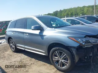 2019 Infiniti QX60 Luxe with VIN 5N1DL0MM7KC567051, listed as a IAAI auction lot 42065874 with 112,379 mi miles and . Bid and sale history available at DreamBid. Image 13.