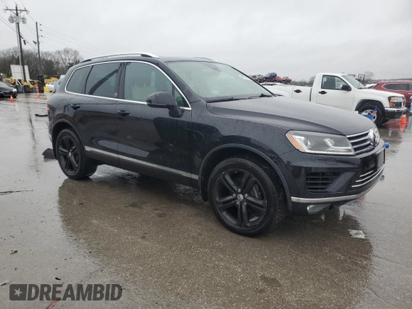 2017 Volkswagen Touareg Wolfsburg Edition z VIN WVGRF7BPXHD006302, wystawiony jako Copart lot #44783475 z przebiegiem 138 244 mil mil oraz Czysty tytuł • Clean title. Historia ofert i sprzedaży dostępna na DreamBid. Obrazek 4.