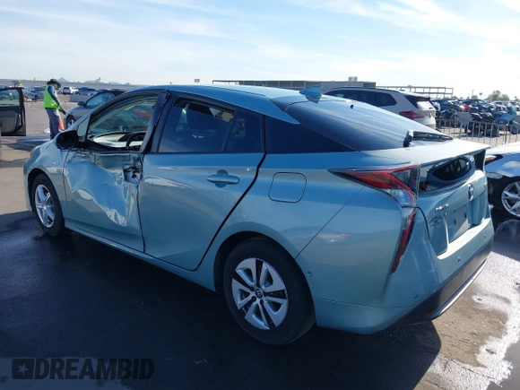 2018 Toyota Prius Two with VIN JTDKBRFUXJ3066430, listed as a IAAI auction lot 42034812 with 119,711 mi miles and . Bid and sale history available at carsss.com. Image 3.