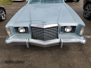 1977 Ford Thunderbird z VIN 7G87S303225, wystawiony jako Copart lot #74216404 z przebiegiem 48 305 mil mil oraz Szkody całkowita. Historia ofert i sprzedaży dostępna na DreamBid. Obrazek 11.
