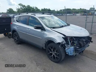 2018 Toyota RAV4 Hybrid SE with VIN JTMJJREV7JD161319, listed as a IAAI auction lot 42594079 with 129,622 mi miles and . Bid and sale history available at DreamBid. Image 1.