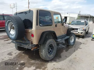 1999 Jeep Wrangler Sahara with VIN 1J4FY49S6XP437964, listed as a IAAI auction lot 41947995 with 118,566 mi miles. Bid and sale history available at carsss.com. Image 4.