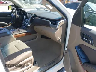 2020 Chevrolet Suburban Premier with VIN 1GNSCJKC9LR125292, listed as a IAAI auction lot 42073858 with 92,363 mi miles and . Bid and sale history available at DreamBid. Image 5.