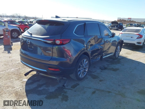 2023 Mazda CX-9 Carbon Edition z VIN JM3TCBDY2P0633889, wystawiony jako IAAI lot #41804791 z przebiegiem 20 454 mil mil oraz . Historia ofert i sprzedaży dostępna na DreamBid. Obrazek 4.