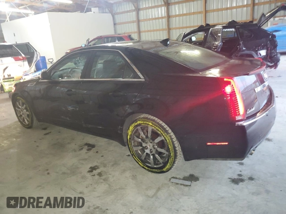 2009 Cadillac CTS RWD с VIN 1G6DF577590169740, выставлен на аукционе Copart как лот 57041055 с пробегом 68 857 миль миль и Списание • Salvage title. История ставок и продаж доступна на DreamBid. Изображение 2.