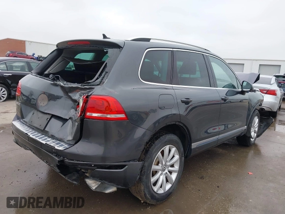 2012 Volkswagen Touareg Sport with VIN WVGEF9BP9CD008545, listed as a IAAI auction lot 41492653 with 138,424 mi miles and . Bid and sale history available at DreamBid. Image 4.