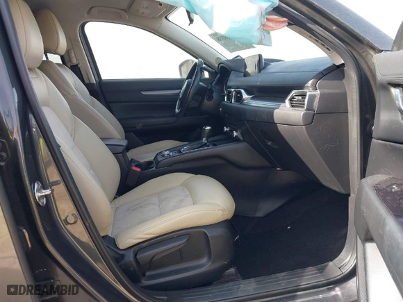 2019 Mazda CX-5 Touring with VIN JM3KFACMXK0686957, listed as a IAAI auction lot 41720338 with 95,421 mi miles. Bid and sale history available at carsss.com. Image 5.