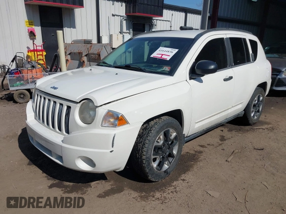 2008 Jeep Compass Sport with VIN 1J8FF47W98D584311, listed as a IAAI auction lot 41644836 with 213,271 mi miles and . Bid and sale history available at carsss.com. Image 17.