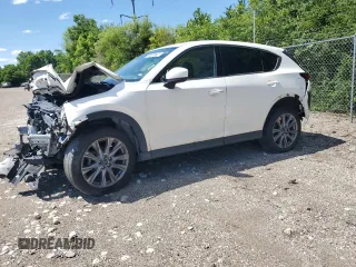 2021 Mazda CX-5 Grand Touring with VIN JM3KFADM3M1329809, listed as a Copart auction lot 61151734 with 1 mi miles and Salvage Title. Bid and sale history available at carsss.com. Image 1.