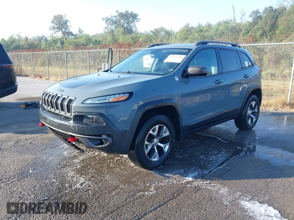 2014 Jeep Cherokee Trailhawk z VIN 1C4PJMBS2EW212341, wystawiony jako IAAI lot #40672694 z przebiegiem 108 622 mil mil oraz . Historia ofert i sprzedaży dostępna na DreamBid. Obrazek 17.
