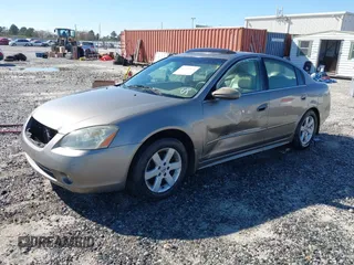 2003 Nissan Altima S with VIN 1N4AL11DX3C228986, listed as a IAAI auction lot 41767378 with 185,362 mi miles. Bid and sale history available at carsss.com. Image 2.
