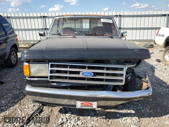 1989 Ford F-150 with VIN 1FTEX15N0KKB51052, listed as a Copart auction lot 70142074 with 74,351 mi miles and Salvage Title. Bid and sale history available at carsss.com. Image 5.
