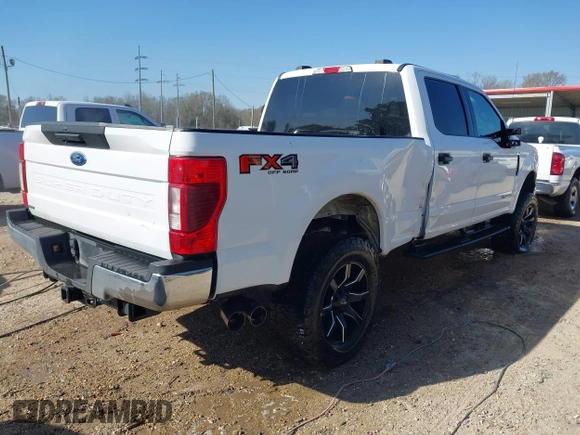 2021 Ford Super Duty F-250 SRW XL with VIN 1FT7W2BT0MED05328, listed as a IAAI auction lot 41744334 with 106,867 mi miles. Bid and sale history available at carsss.com. Image 4.