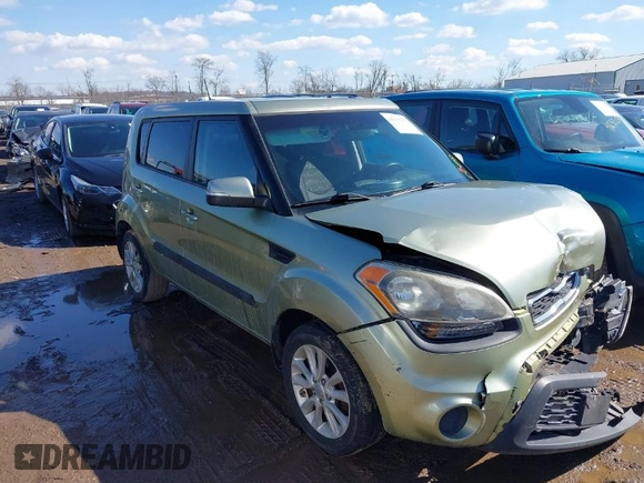 2012 Kia Soul + with VIN KNDJT2A65C7403543, listed as a IAAI auction lot 41633273 with 128,988 mi miles. Bid and sale history available at carsss.com. Image 1.