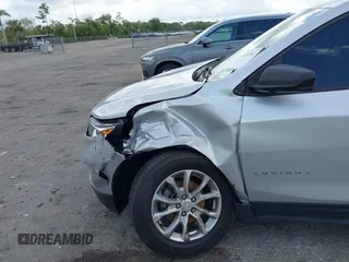 2020 Chevrolet Equinox LS z VIN 3GNAXHEV8LS696940, wystawiony jako IAAI lot #42153761 z przebiegiem 60 309 mil mil oraz . Historia ofert i sprzedaży dostępna na DreamBid. Obrazek 6.