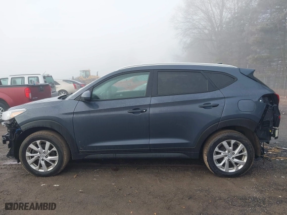 2019 Hyundai Tucson Value with VIN KM8J33A44KU995257, listed as a IAAI auction lot 41672206 with 63,090 mi miles. Bid and sale history available at carsss.com. Image 15.