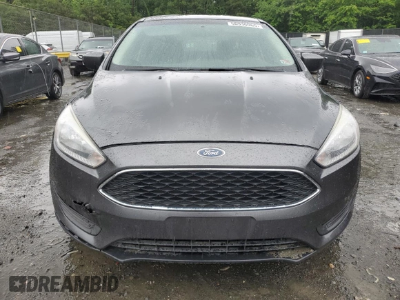 2018 Ford Focus SE z VIN 1FADP3F21JL285417, wystawiony jako Copart lot #56936965 z przebiegiem Nie podano mil oraz Czysty tytuł • Clean title. Historia ofert i sprzedaży dostępna na DreamBid. Obrazek 5.