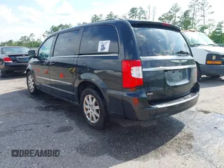 2013 Chrysler Town & Country Touring z VIN 2C4RC1BG5DR742792, wystawiony jako IAAI lot #42005481 z przebiegiem 204 002 mil mil oraz . Historia ofert i sprzedaży dostępna na DreamBid. Obrazek 3.