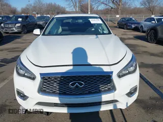 2021 Infiniti Q50 Luxe z VIN JN1EV7BR9MM754818, wystawiony jako IAAI lot #41687198 z przebiegiem 15 985 mil mil oraz . Historia ofert i sprzedaży dostępna na DreamBid. Obrazek 12.