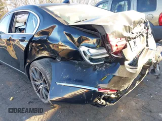 2016 BMW 7 Series 740i z VIN WBA7E2C55GG548125, wystawiony jako IAAI lot #41351277 z przebiegiem Nie podano mil oraz . Historia ofert i sprzedaży dostępna na DreamBid. Obrazek 6.