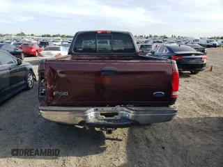 2000 Ford F-150 with VIN 1FTRX17W5YKA50203, listed as a Copart auction lot 54734615 with Not Provided miles and Salvage Title. Bid and sale history available at DreamBid. Image 6.