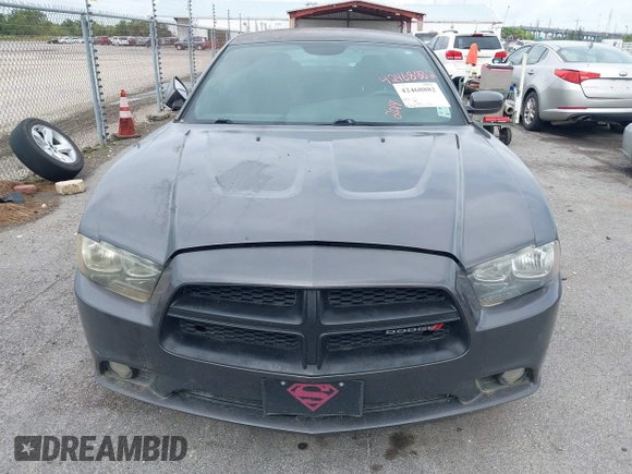 2014 Dodge Charger Police z VIN 2C3CDXAT9EH191184, wystawiony jako IAAI lot #42468882 z przebiegiem 202 790 mil mil oraz . Historia ofert i sprzedaży dostępna na DreamBid. Obrazek 6.