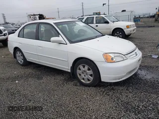 2002 Honda Civic EX with VIN 1HGES26702L074649, listed as a IAAI auction lot 40975048 with 151,975 mi miles and . Bid and sale history available at carsss.com. Image 1.
