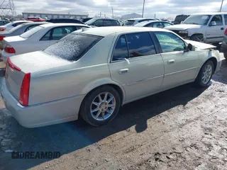 2010 Cadillac DTS w/1SC with VIN 1G6KD5EY2AU105662, listed as a IAAI auction lot 41739669 with 126,335 mi miles. Bid and sale history available at carsss.com. Image 4.