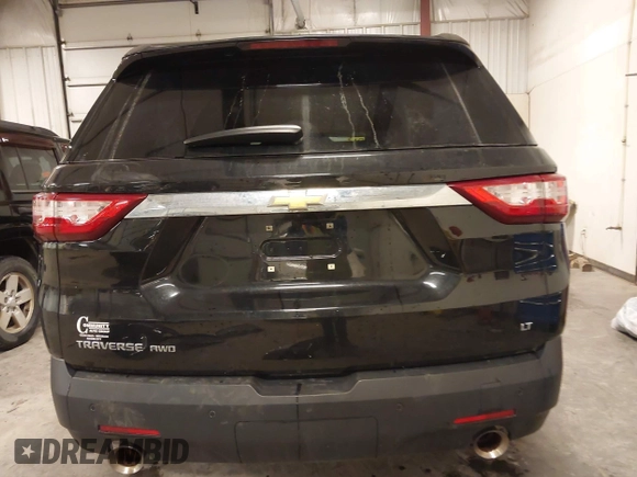 2018 Chevrolet Traverse LT Cloth z VIN 1GNEVGKW2JJ232734, wystawiony jako IAAI lot #41931040 z przebiegiem 91 580 mil mil oraz . Historia ofert i sprzedaży dostępna na DreamBid. Obrazek 17.