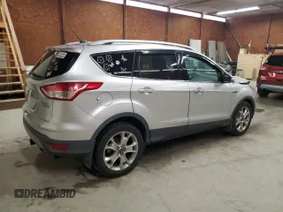2014 Ford Escape Titanium с VIN 1FMCU0J94EUD41993, выставлен на аукционе Copart как лот 56933605 с пробегом 104 011 миль миль и Списание • Salvage title. История ставок и продаж доступна на DreamBid. Изображение 3.