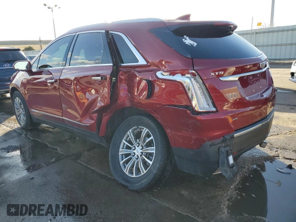 2019 Cadillac XT5 Luxury AWD with VIN 1GYKNDRSXKZ286616, listed as a Copart auction lot 48807865 with 77,074 mi miles and Salvage Title. Bid and sale history available at carsss.com. Image 2.