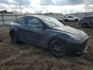2024 Tesla Model Y Long Range with VIN 7SAYGDEE0RF985007, listed as a Copart auction lot 46619755 with Not Provided miles and Salvage Title. Bid and sale history available at DreamBid. Image 4.