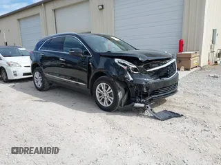 2020 Cadillac XT5 Luxury FWD z VIN 1GYKNAR47LZ233129, wystawiony jako IAAI lot #41686521 z przebiegiem 29 012 mil mil oraz . Historia ofert i sprzedaży dostępna na DreamBid. Obrazek 1.
