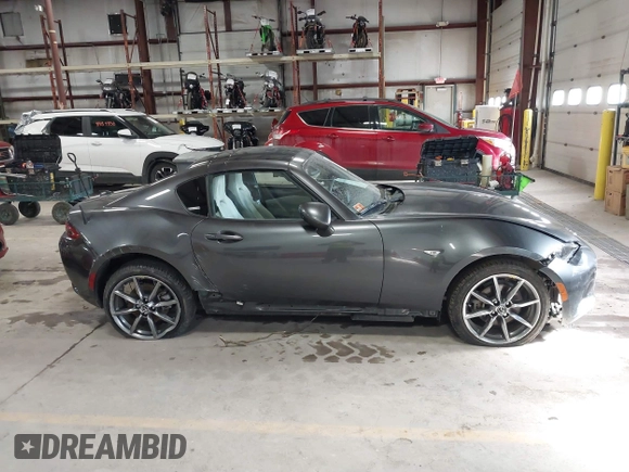 2021 Mazda MX-5 Miata Grand Touring with VIN JM1NDAM73M0451484, listed as a IAAI auction lot 41485044 with 11,328 mi miles and . Bid and sale history available at DreamBid. Image 13.