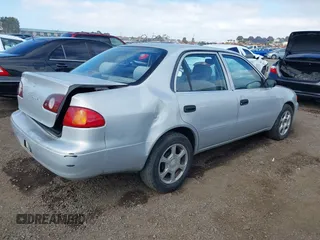 2002 Toyota Corolla CE with VIN 1NXBR12E12Z639542, listed as a IAAI auction lot 41535788 with 204,999 mi miles and . Bid and sale history available at DreamBid. Image 4.