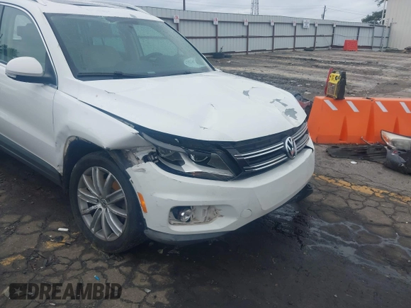 2012 Volkswagen Tiguan SEL with VIN WVGAV7AX0CW507942, listed as a IAAI auction lot 41854498 with 177,117 mi miles and . Bid and sale history available at DreamBid. Image 6.