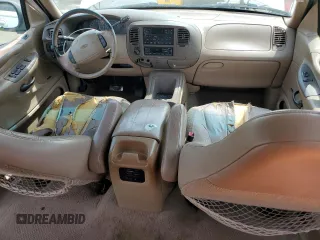 1999 Ford Expedition XLT z VIN 1FMPU18L0XLC10111, wystawiony jako Copart lot #52699205 z przebiegiem Nie podano mil oraz Szkoda całkowita • Salvage title. Historia ofert i sprzedaży dostępna na DreamBid. Obrazek 8.