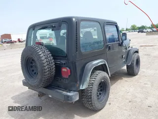 1999 Jeep Wrangler Sport z VIN 1J4FY19S0XP471848, wystawiony jako IAAI lot #42264563 z przebiegiem 280 121 mil mil oraz . Historia ofert i sprzedaży dostępna na DreamBid. Obrazek 4.