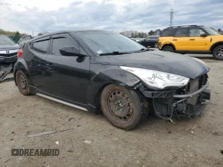 2013 Hyundai Veloster Turbo z VIN KMHTC6AE7DU152689, wystawiony jako Copart lot #51569125 z przebiegiem 102 152 mil mil oraz Szkoda całkowita • Salvage title. Historia ofert i sprzedaży dostępna na DreamBid. Obrazek 4.