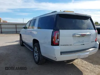 2019 GMC Yukon XL Denali with VIN 1GKS1HKJ8KR378385, listed as a IAAI auction lot 41824529 with 115,481 mi miles. Bid and sale history available at carsss.com. Image 3.