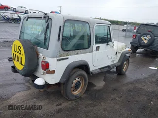 1990 Jeep Wrangler with VIN 2J4FY29T6LJ523487, listed as a IAAI auction lot 42008870 with 88,619 mi miles and . Bid and sale history available at DreamBid. Image 4.